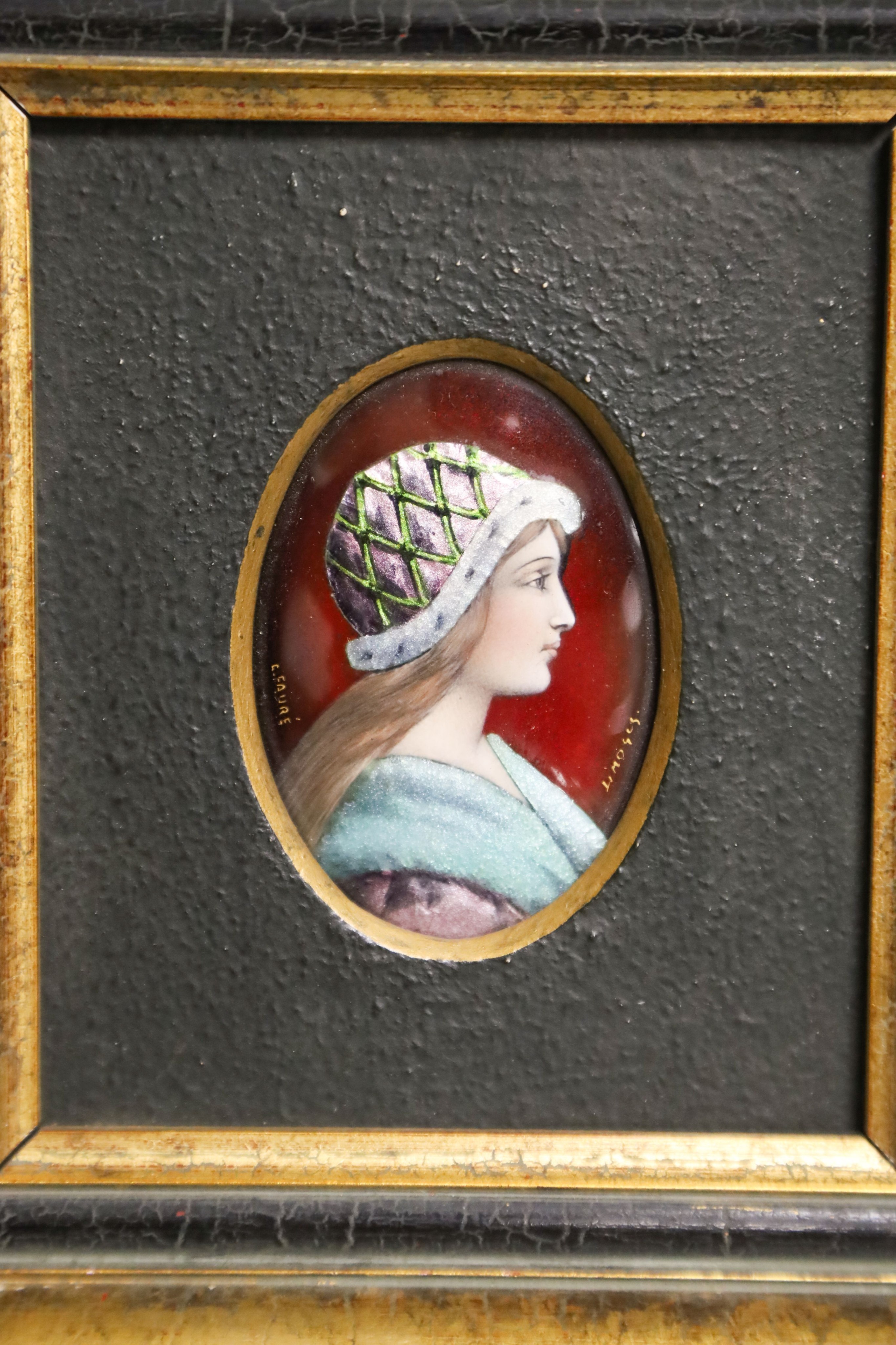 A small oval Limoges miniature enamelled portrait plaque, signed L. Fauré, framed 8x5.5cm excl frame